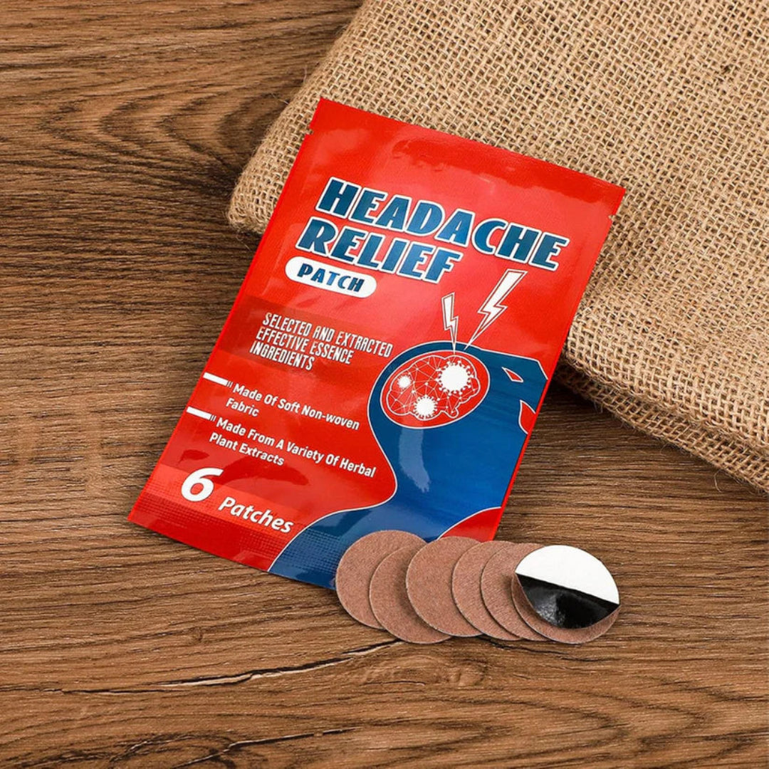 Headache relief patch package with patches on a wooden surface