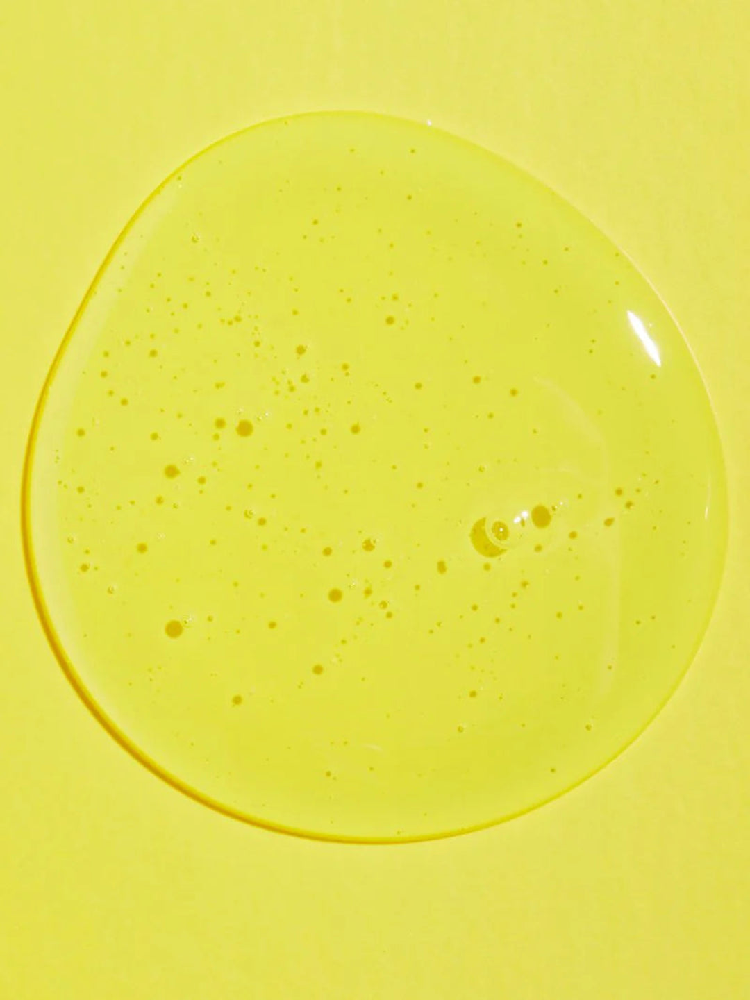 Yellow plate with a circular design on a yellow background