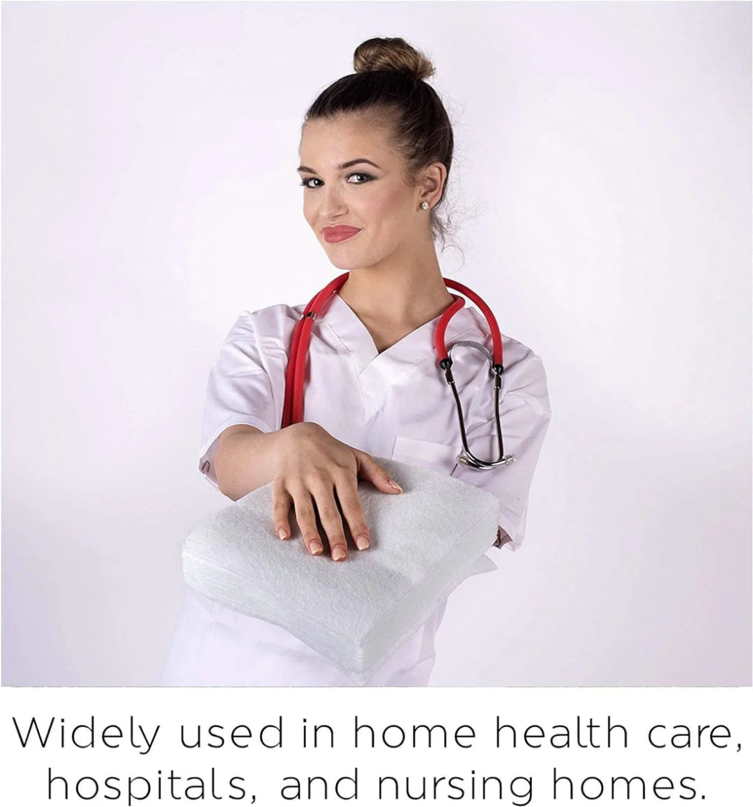 Woman in a white coat with a stethoscope, holding a white pillow against a light background.