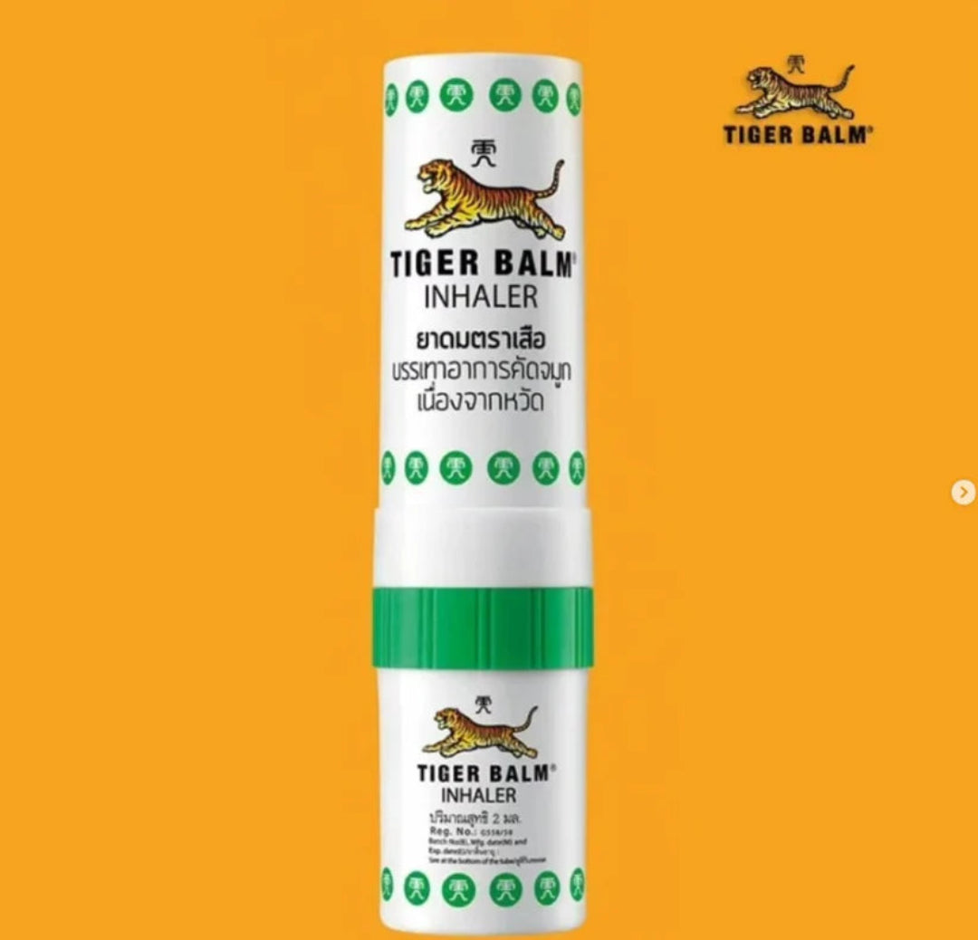 Tiger Balm Inhaler on an orange background