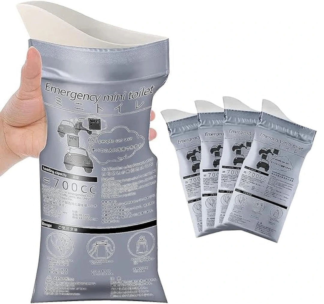 Hand holding an emergency mini toilet bag with additional bags displayed on a white background
