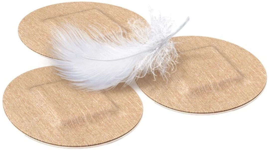 Two straw hats with white feathers on a white background