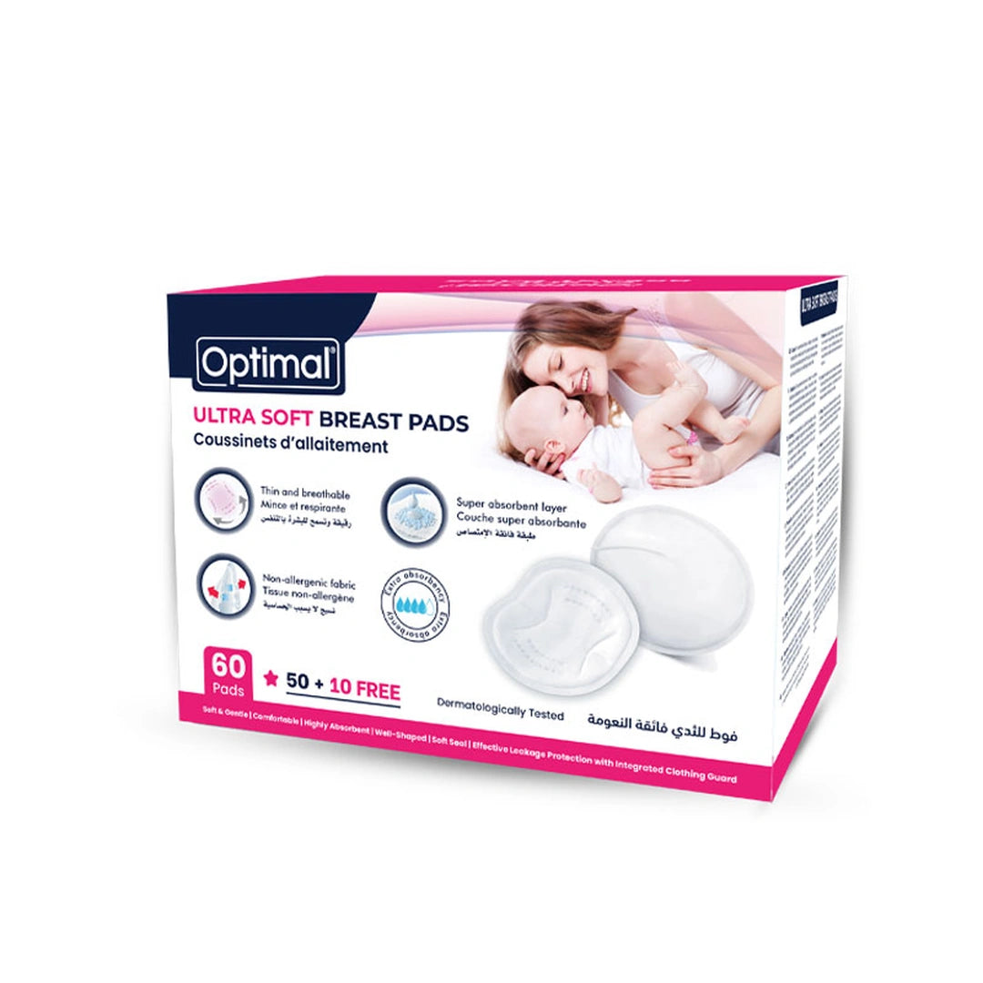 Optimal Ultra Soft Breast Pads box containing 60 pads with 10 free liners, shown on a white background with a graphic of a mother and baby on the packaging.