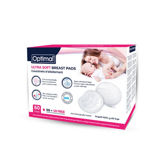 Optimal Ultra Soft Breast Pads box containing 60 pads with 10 free liners, shown on a white background with a graphic of a mother and baby on the packaging.