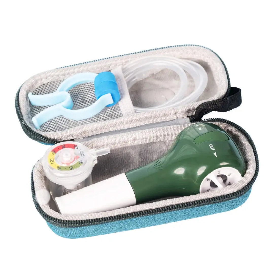 Green and white device with blue and white components in an open case on a white background