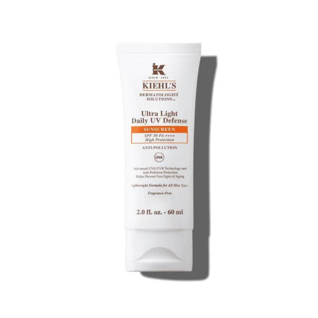 Kiehl's Ultra Light Daily UV Defense sunscreen tube on a white background