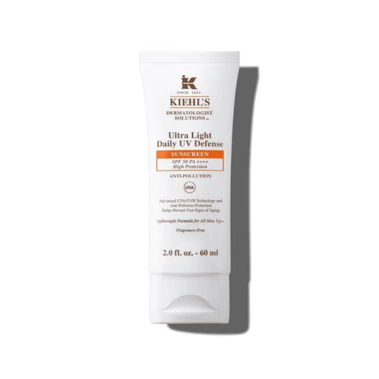 Kiehl's Ultra Light Daily UV Defense sunscreen tube on a white background
